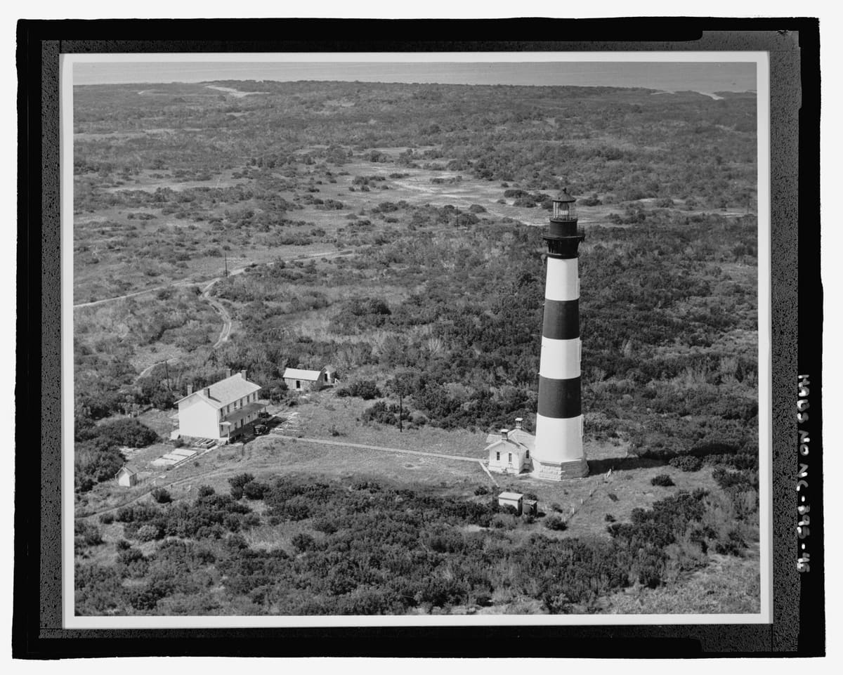 A 1944 black and white aerial photograph of the light station surrounded by open ground