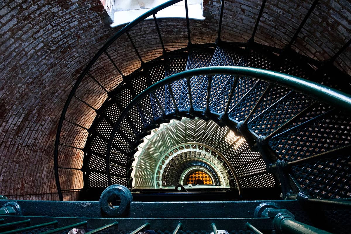 Looking up through the centre of the cast iron spiral staircase